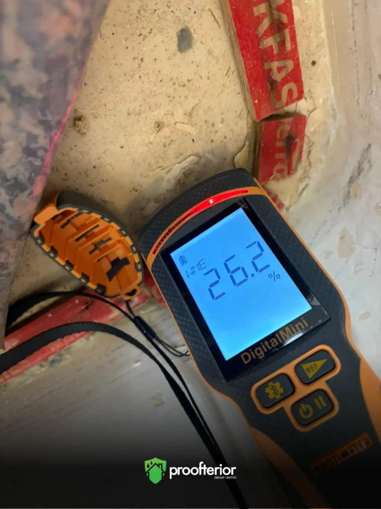 Proofterior damp survey showing 26.2% moisture reading on digital meter in Hampshire property wall.