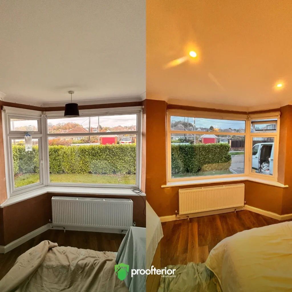 Finished bay window area with radiator and newly insulated walls, showing improved room temperature retention.