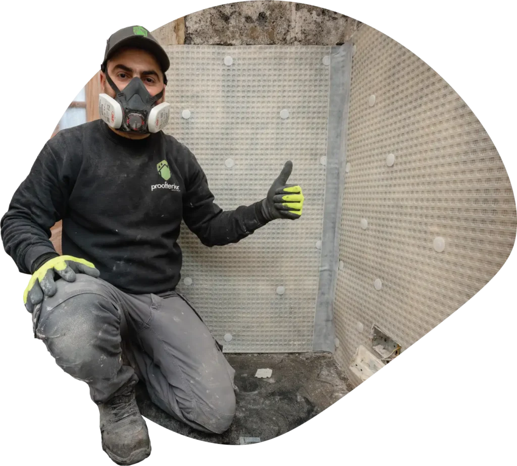 Proofterior damp specialist doing a damp proof course membrane